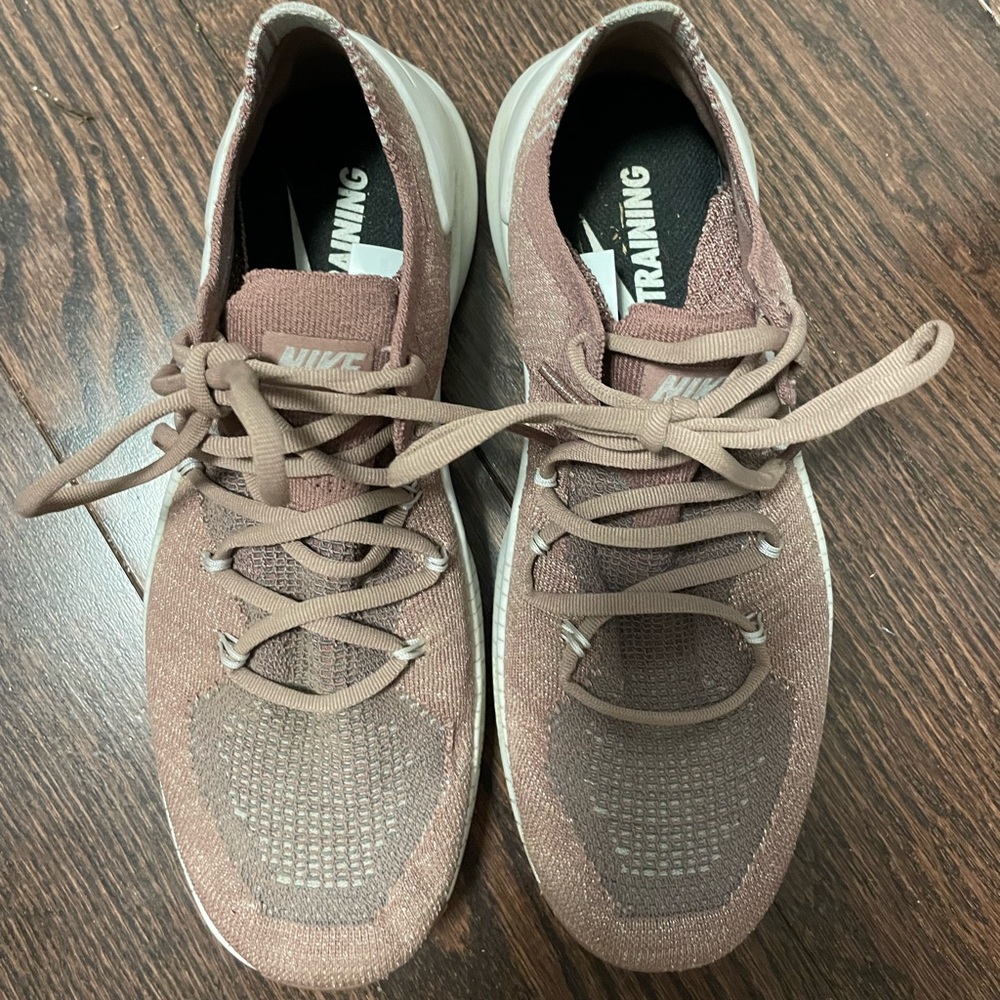 Nike pink slip on/lace up sneaker. Size 6.5